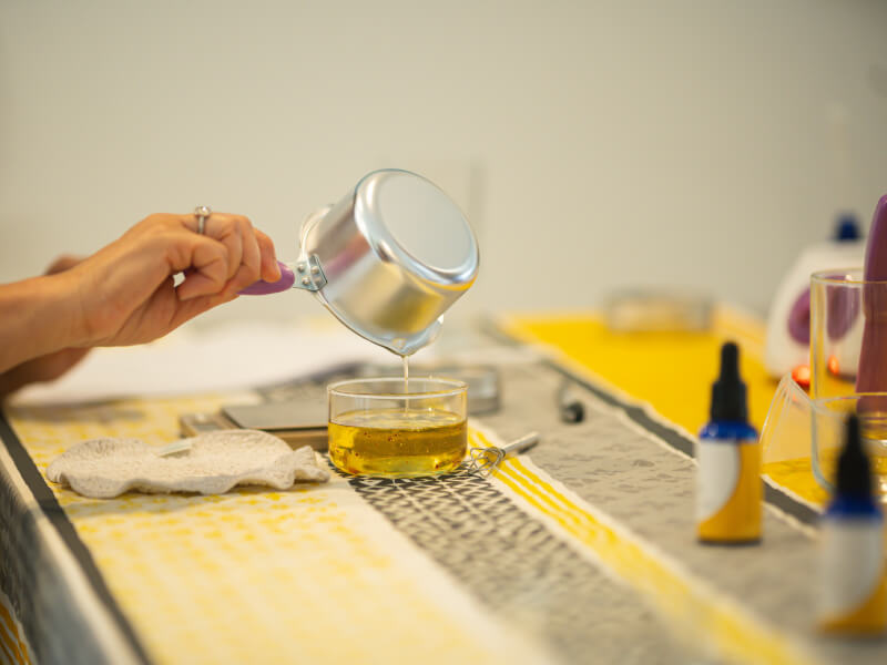 pouring natural skincare products